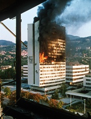 Централният офис на     в Сараево подпален от    с което се обявява  започване на зимните олимпйски игри.